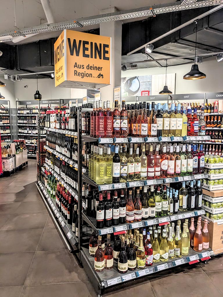 Detail des REWE Getränkemarktes, am 22. September 2025
